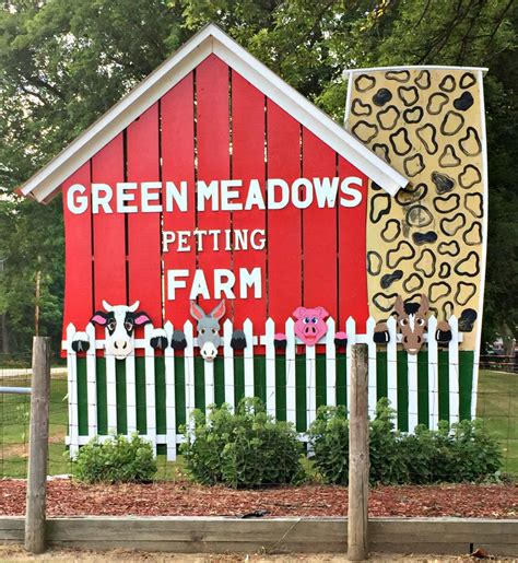 The farm is located in the country and is surrounded by oak trees. Green Meadows Petting Farm Review | Soph & Jack