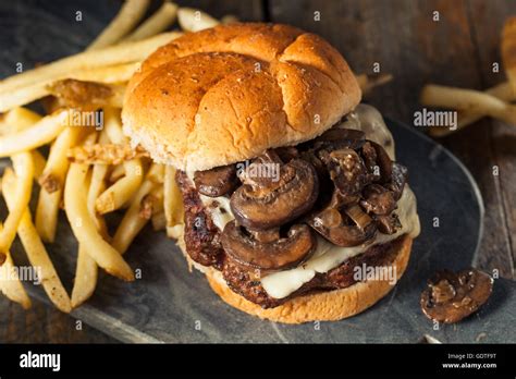 Homemade Grassfed Mushroom And Swiss Cheese Hamburger With Fries Stock