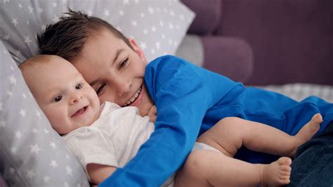 Loving Siblings Embrace Adorable Baby Joyful Stock Footage Sbv