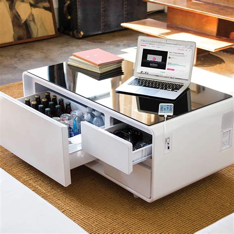 Dual bluetooth speakers on each side of the sobro coffee table deliver enhanced sound and rich bass. This smart coffee table is equipped with a mini fridge ...