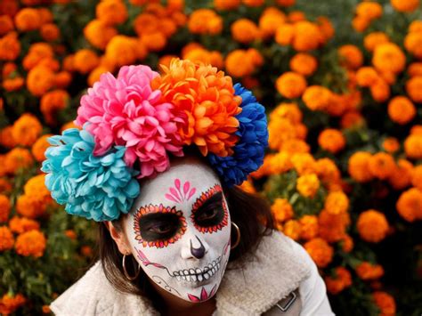 Day Of The Dead Parade In Mexico Features Painted La Catrina Faces And