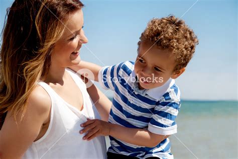 Beautiful Young Mom Plays With Her Cheerful Son Royalty Free Stock