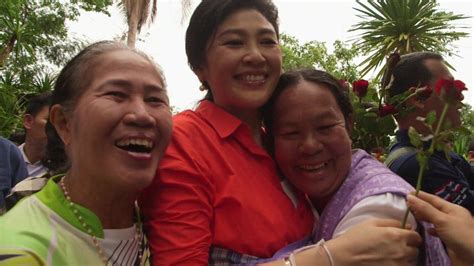yingluck shinawatra steps back into thailand s political arena bbc news