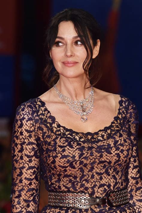 Monica Bellucci Wore An Azzedinealaia Fall 2016 Navy Lace Gown To The
