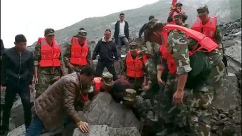 video desperate search for landslide survivors in china abc news