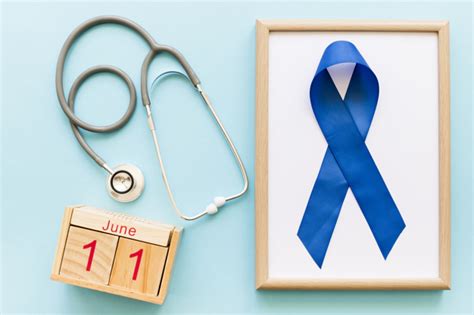 These ribbons are adorned by people from all over the globe thereby, all efforts despite how big or small, bring us a step closer to the innate goal. Men s health week awareness blue ribbon on wooden white ...
