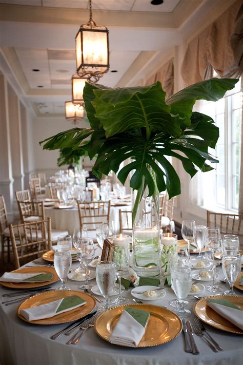 giant palm leaves as centerpiece, dramatic yet cost effective and easy