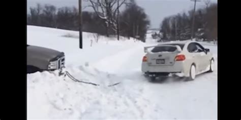 Watch A Subaru Wrx Sti Pull A Ford F 250 4x4 Out Of A Snowbank Video