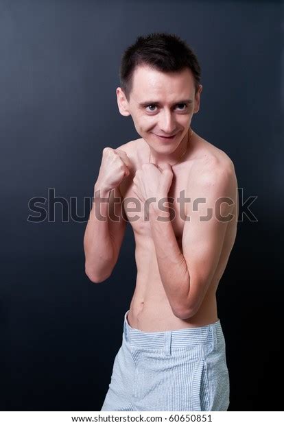 Skinny Topless Man Showing His Muscles写真素材 Shutterstock