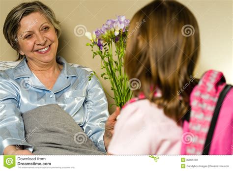 Little Girl Visiting Her Ill Grandmother Stock Photo - Image of ...