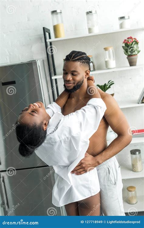 African American Couple Smiling And Hugging Stock Image Image Of