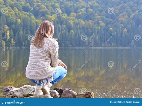 Beautiful Young Woman Relaxing Near A Lake Stock Photo Image Of Diet
