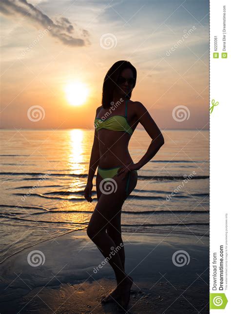 Silhouette Of Woman In Bikini On Beach At Sunset Stock Image Image Of