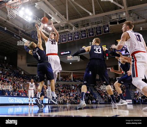Gonzagas Kyle Wiltjer 33 Shoots Against Byus Chase Fischer 1 During The Second Half Of An