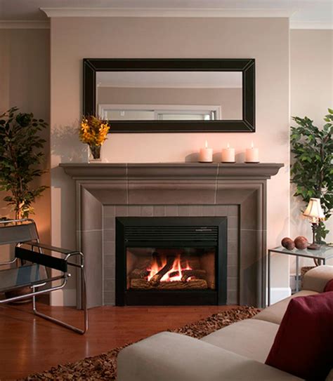The stacked stone ledgers are strips of dark, charcoal marble glued to interlocking panels for easy installation. Beautiful Fireplace Mantels Ideas to Warm Your Home in the Winter - MidCityEast