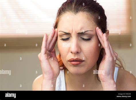 Woman Suffering From Headache Stock Photo Alamy