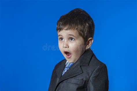 Leader Cute Little Boy Portrait Over Blue Chroma Background Stock