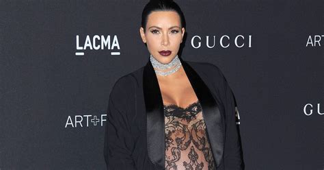 Kim Kardashian Puts Bump On Display In Sheer Lacey Ensemble