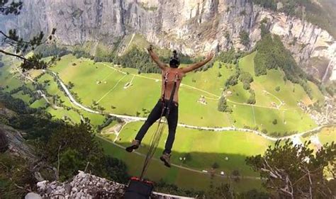 Video Base Jumper Leaps With Parachute Attached To His Skin Weird