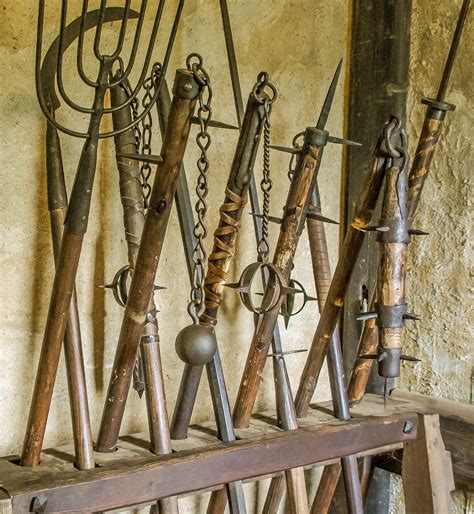 A Fearsome Array Of Medieval Hand Weapons Including Flail