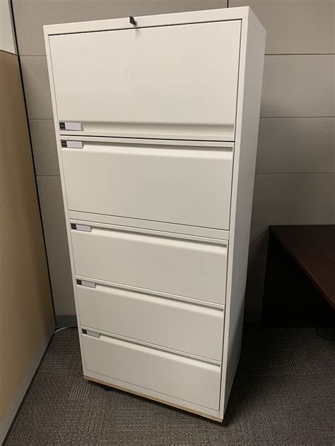 Perfect for any office with cramped storage space, this filing cabinet is a stylish addition to your arrangement. 5 Drawer Lateral Filing Cabinet Teknion White