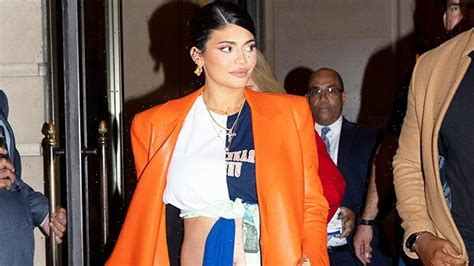 Kylie Jenner Cradles Her Baby Bump And Channels Kim Kardashian In All Red