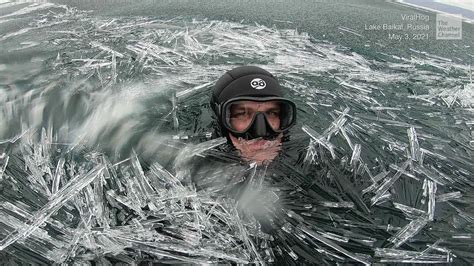 Swimmer Plows Through Sea Of Ice Needles In Russias Lake Baikal