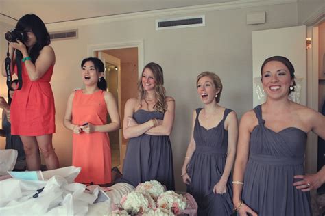 Wedding Party And Bridesmaids Reaction To The Bride After Her Wedding Dress Is On At A Hotel
