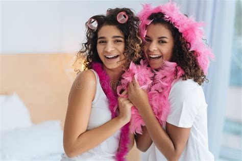 Mulatto Sisters Are Sitting Back To Back Playing Stock Image Image Of Green Concept 73541877