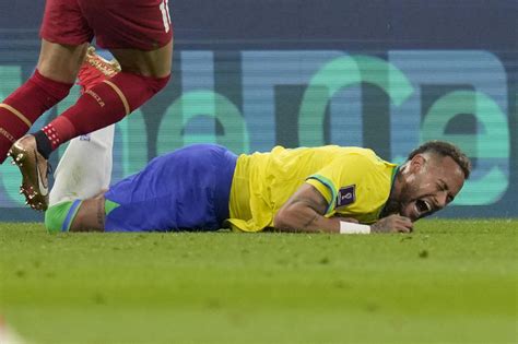 world cup brazil star neymar left with severely swollen sprained ankle in foul plagued win over