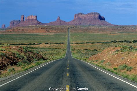 Highway 163 Leading Into Monument Valley With Rock Formations Jim