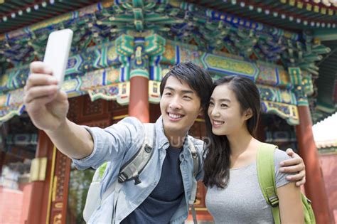 Chinese Couple Taking Selfie In Lama Temple — Woman Architecture