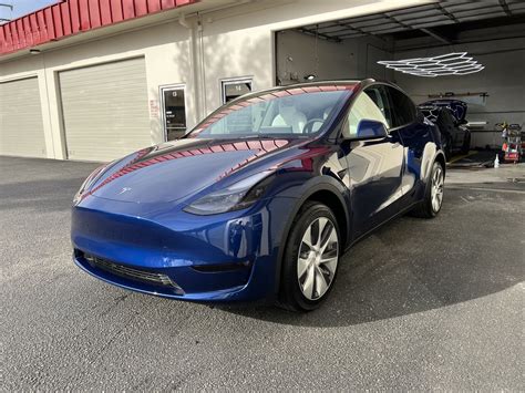 2023 Tesla Model Y Blue Metallic — Detailership