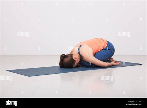 Beautiful Sporty Fit Yogi Girl Practices Yoga Asana Balasana Stock