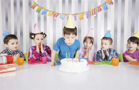 Cute Boy Blowing Candles On Birthday Cake Fab