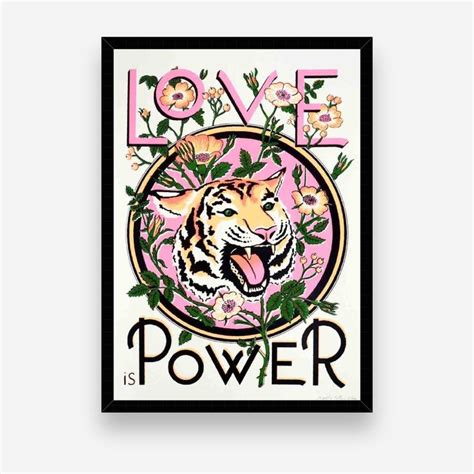 A Pink Poster With A Tiger On Its Face And The Words Love Is Power