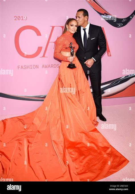 Fashion Icon Award Honoree Jennifer Lopez Left Poses With Her Fiancé