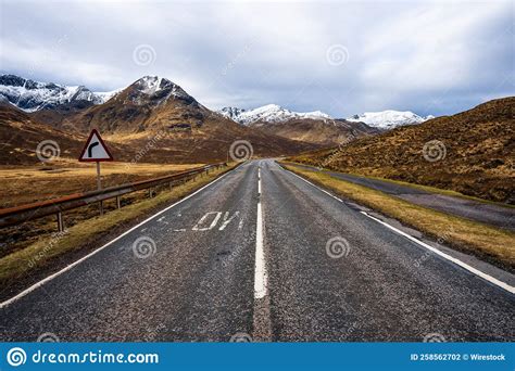 Highway And Beautiful Mountain Vistas In Scottish Highlands Near Isle