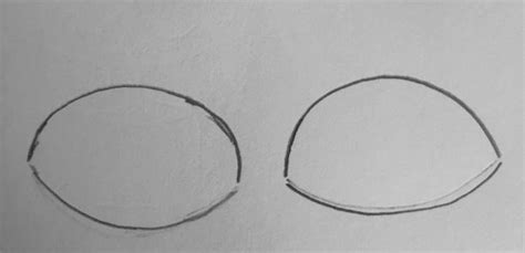 Two Circles Are Drawn On A Piece Of Paper