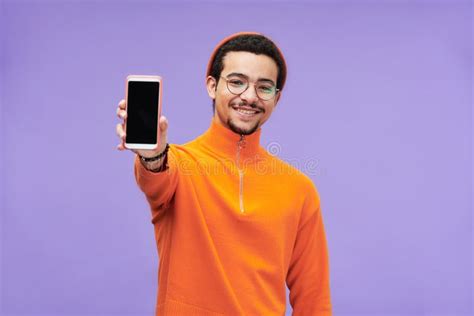 Young Cheerful Man In Casualwear Showing Smartphone With Blank Screen Stock Image Image Of