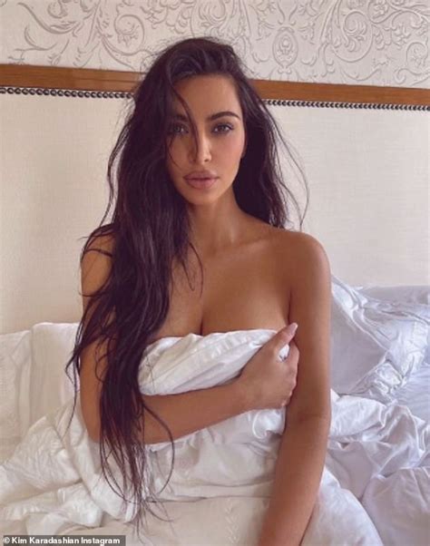 Kim Kardashian Poses Topless In Bed For Sultry Snap
