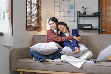 Asian Beautiful Lesbian Women Couple Hugging Girlfriend In Living Room Attractive Two Female
