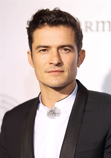 Orlando bloom brought his puppy to milan fashion week and it's the cutest thing i've seen in 2020. You Have to See Orlando Bloom's Platinum Hair | InStyle.com