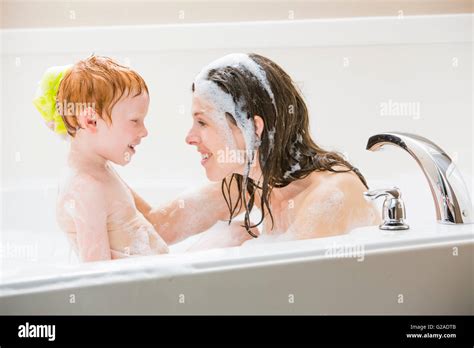 Mother And Son Having Bubble Bath Stock Photo Alamy