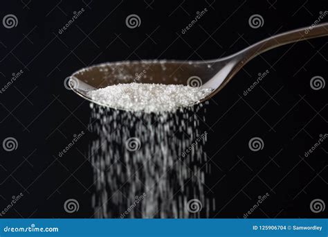 Sugar Pouring From A Spoon Stock Photo Image Of Glucose 125906704