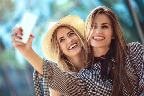 Two Female Friends Taking A Selfies Stock Image Image Of Tourism Tablet 115785725