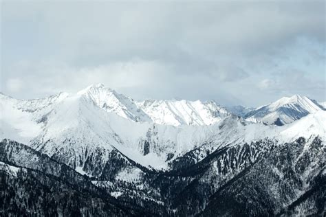 Snow Covered Mountains During Daytime Photo Free Mountain Image On