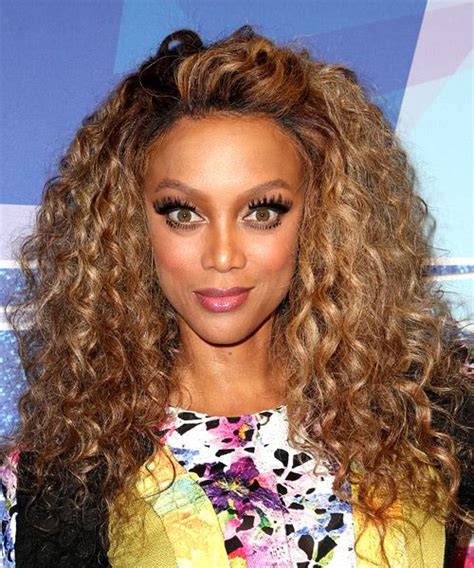 Tyra Banks Long Curly Casual Hairstyle Dark Blonde Hair Color