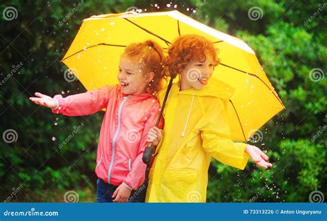 Girl And Boy During A Rain Under One Umbrella Stock Photo Image Of