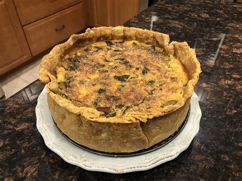 Homemade Quiche With Ham Onion And Spinach And An Herb Crust Rfood